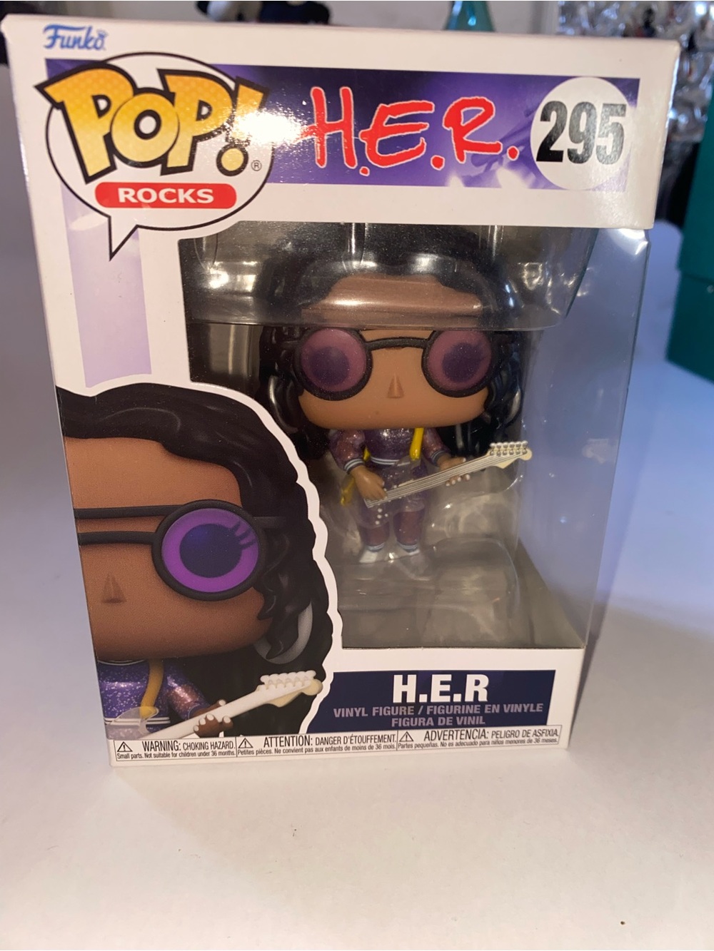 Funko Pop! H.E.R. Vinyl Figure in Purple with Gold Guitar Accent